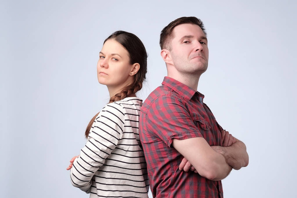 Young european couple standing against white gray background - Photo, Image