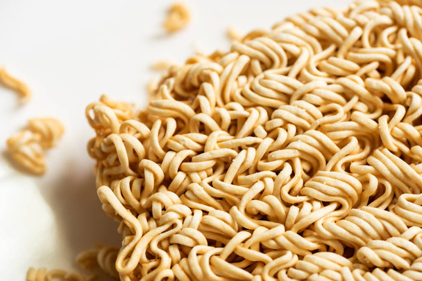 dry instant noodles on a plate - Photo, Image