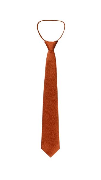 Paisley-Muster stilvoll eng gebunden orange Krawatte isoliert auf weißem Hintergrund - Foto, Bild