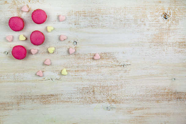 Strawberry macarons and marshmallows  - Фото, изображение