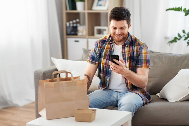 man using smartphone for food delivery - Фото, зображення