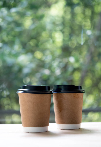 Two brown craft paper coffee cup. - Φωτογραφία, εικόνα