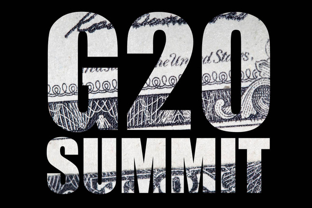 Надпись на саммите "Группы двадцати" с текстурой банкнот внутри на чёрном фоне
 - Фото, изображение