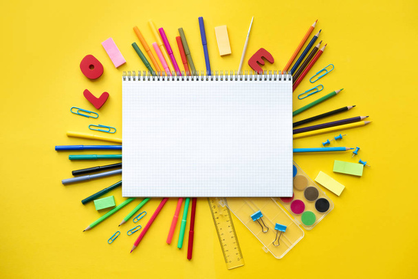 School supplies on yellow background. Concept back to school. Copy space - Φωτογραφία, εικόνα