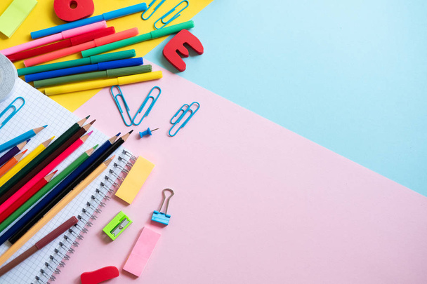 School supplies on colorful background. Concept back to school. Copy space - Φωτογραφία, εικόνα