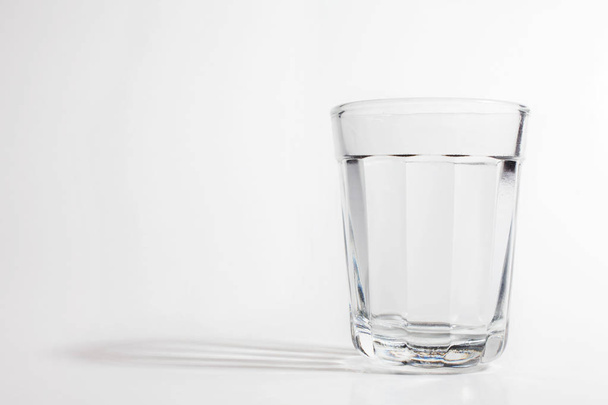 close up view of empty glass on light background - Foto, Imagen