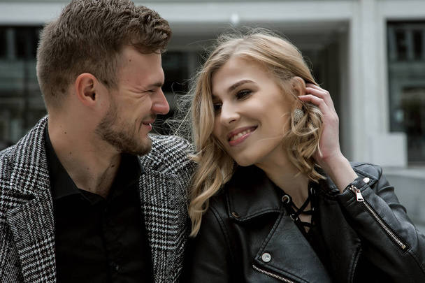 Love story in city. a lovely couple travels to Europe. Stylish guy and girl. Warsaw. Happy couple - Photo, Image