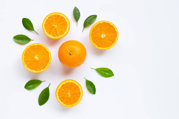 Fresh orange citrus fruit with leaves isolated on white backgrou - Foto, afbeelding