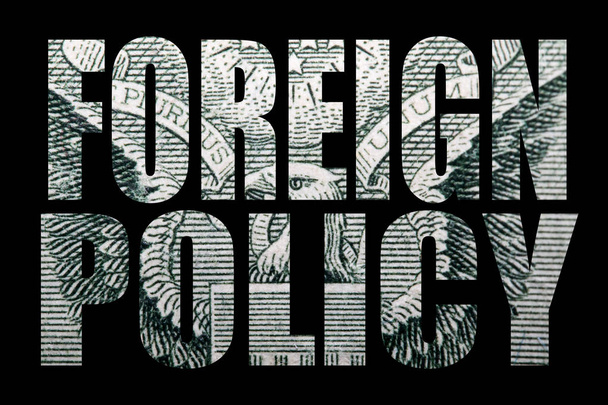 Внешняя политика надпись с деньгами внутри на черном фоне
 - Фото, изображение