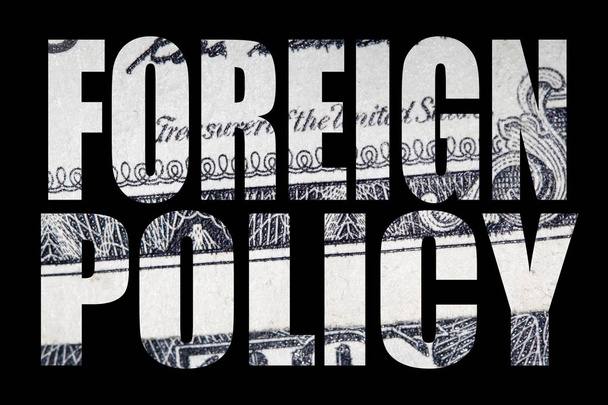 Зовнішня політика напис з грошима всередині на чорному тлі
 - Фото, зображення