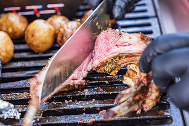 chef making grilled ribs outdoors - Valokuva, kuva