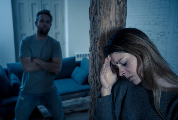 Social issues Domestic violence concept. Alcoholic and abuser partner beating and threatening his terrified wife. Violent man physically abusing scared girlfriend terrified of aggression and abuse. - Foto, immagini