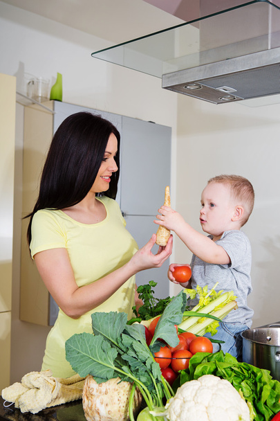 Mother and child preparing soup - Photo, Image