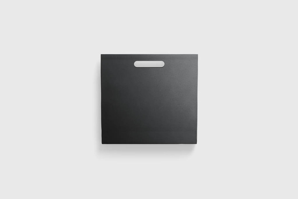 Μαύρη χάρτινη σακούλα ανακορώνεται απομονωμένη σε ανοιχτό γκρι φόντο. Ρεαλιστική φωτογραφία. απόδοση 3D - Φωτογραφία, εικόνα