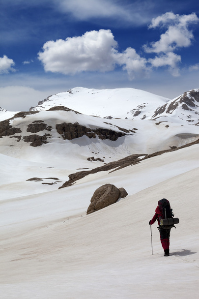 Hiker in snow mountains - 写真・画像
