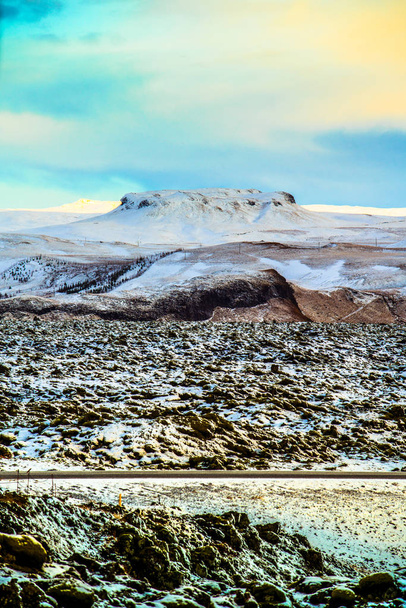 Snowy mossy lava field in Iceland - Foto, imagen