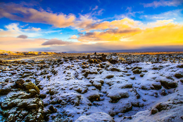Snowy mossy lava field in Iceland - Photo, Image