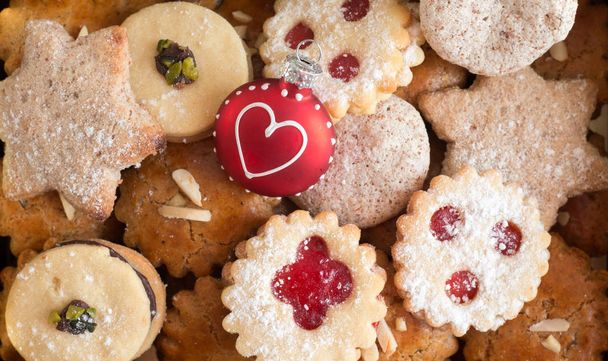 Homemade Christmas cookies: Delicious cookies and Christmas baub - Photo, Image