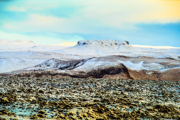 Snowy mossy lava field in Iceland - Φωτογραφία, εικόνα