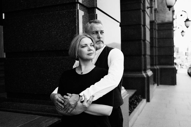Elegant middle age couple on the street - Φωτογραφία, εικόνα