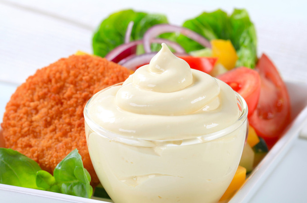 Fried cheese with vegetable salad and mayonnaise - Photo, Image