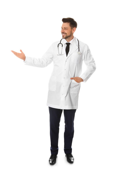 Full length portrait of male doctor isolated on white. Medical staff - Фото, изображение