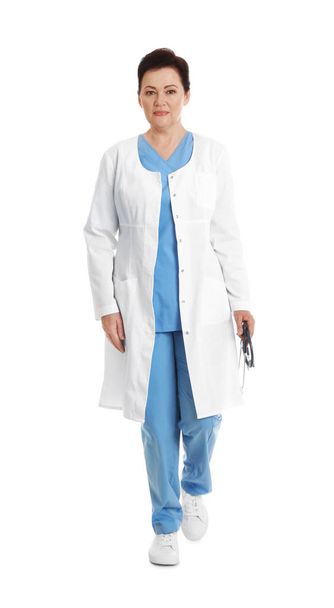Full length portrait of female doctor isolated on white. Medical staff - Фото, изображение