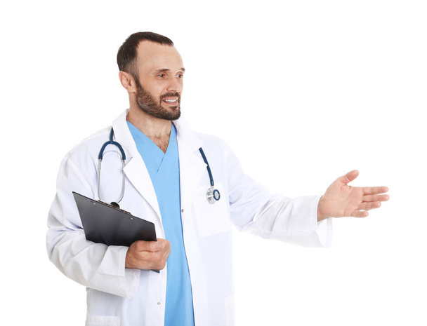 Portrait of male doctor with clipboard isolated on white. Medical staff - Foto, Bild