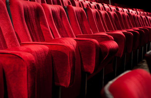 Red theater chairs - 写真・画像