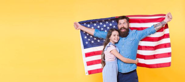 Liberty for you and me. How do americans celebrate independence day. Father american bearded hipster and cute little daughter with USA flag. Independence is happiness. Independence day holiday - Fotografie, Obrázek