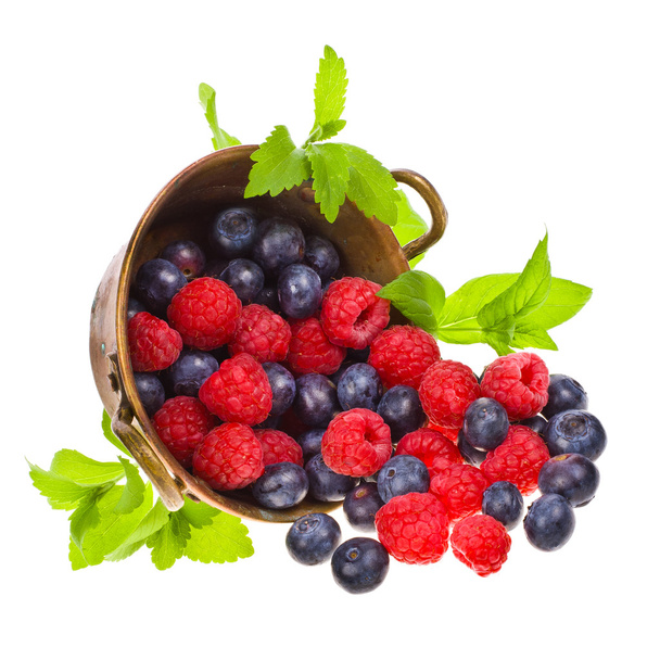 Raspberries and blueberries - 写真・画像