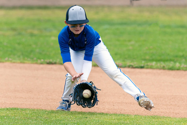 Watching the ball into the glove - Photo, Image
