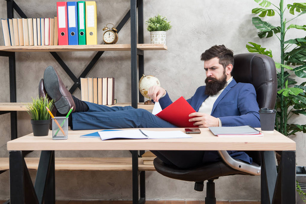 Analyzing financial report. Accounting and banking. Guy banker accountant learn indicators markers. Financial report. Owner of small business. Man bearded businessman sit office read business report - Fotoğraf, Görsel