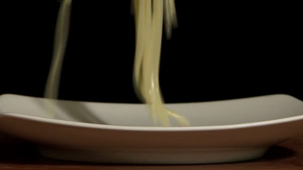 Serving spaghetti in a dish - Footage, Video