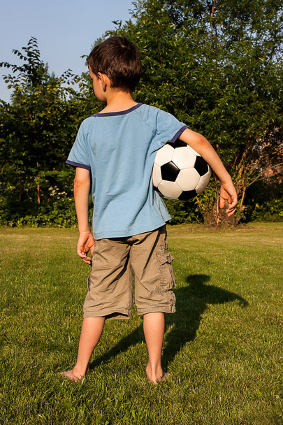 Boy with a football - Zdjęcie, obraz