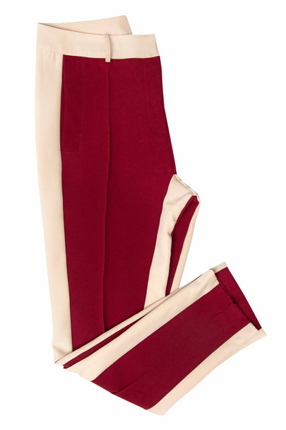 Червоні жіночі штани зі смугами з боків ізольовані на білому тлі
 - Фото, зображення