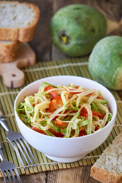 Salad with green radish and bell pepper in a white bowl                                - Fotoğraf, Görsel