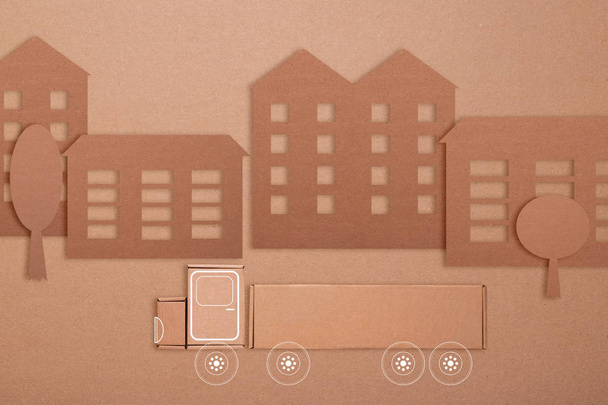 Caja de cartón marrón ciudad, concepto de transporte
 - Foto, Imagen