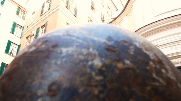 marble sphere on the sidewalk in the center of Genoa - Foto, immagini
