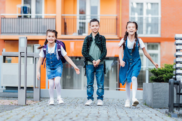 Happy school children in uniform, back to school, selective focus - Fotoğraf, Görsel