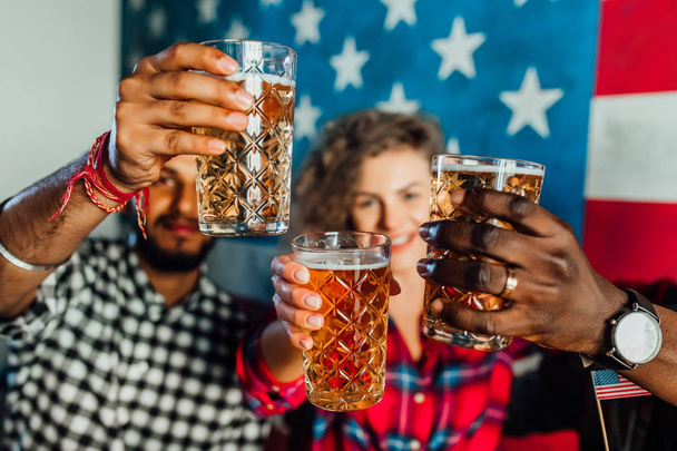 happy friends drinking beer in bar together, selective focus - Φωτογραφία, εικόνα
