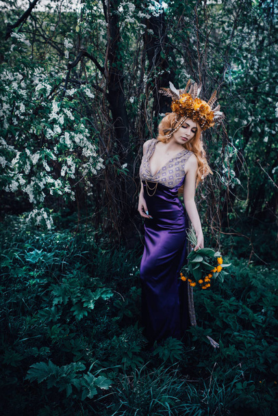 Nymph in the woods with blooming lights - 写真・画像