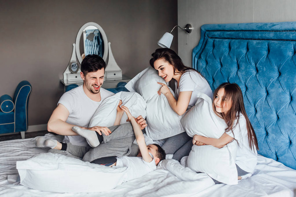 family spending time together in bed at home   - Fotoğraf, Görsel