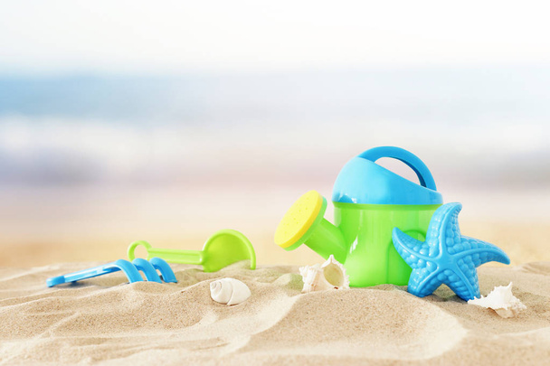 vacation and summer image with beach colorful toys for kid over the sand - Фото, зображення
