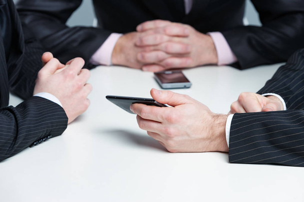 Három üzletember keze egy találkozón - Fotó, kép