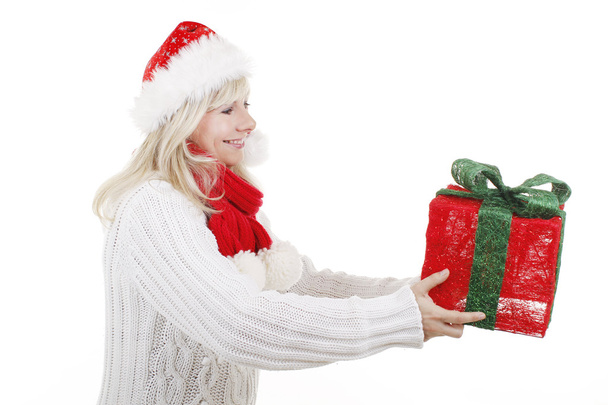 Woman with santa hat smiling - Foto, afbeelding
