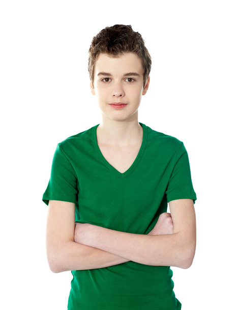 Casual smart boy posing with his arms crossed - Fotó, kép