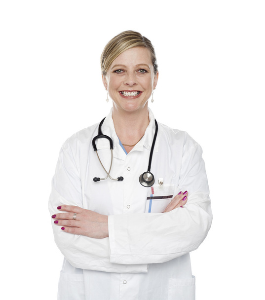 Attractive female physician in uniform - Фото, изображение