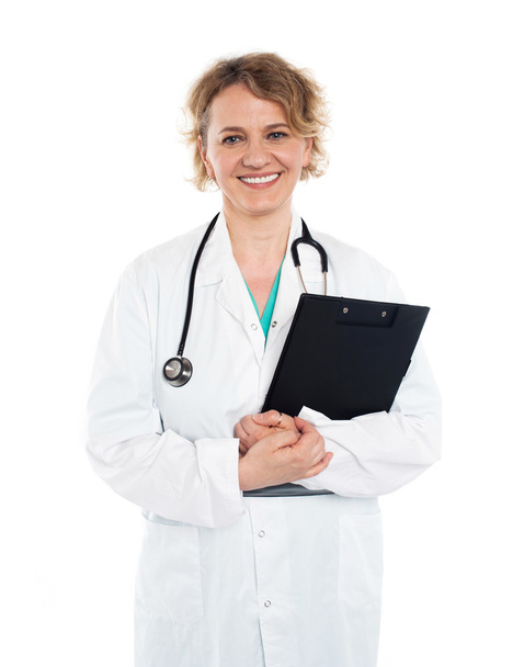 Attractive female physician in uniform - Foto, imagen