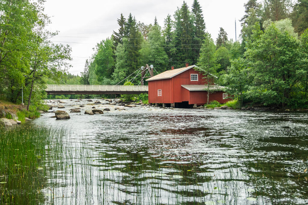 Old mill, dam and threshold on the river Jokelanjoki, Kouvola, Finland - Photo, Image